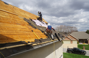 Perfect Time Builders crew repairing storm damage on a Lincoln NE home