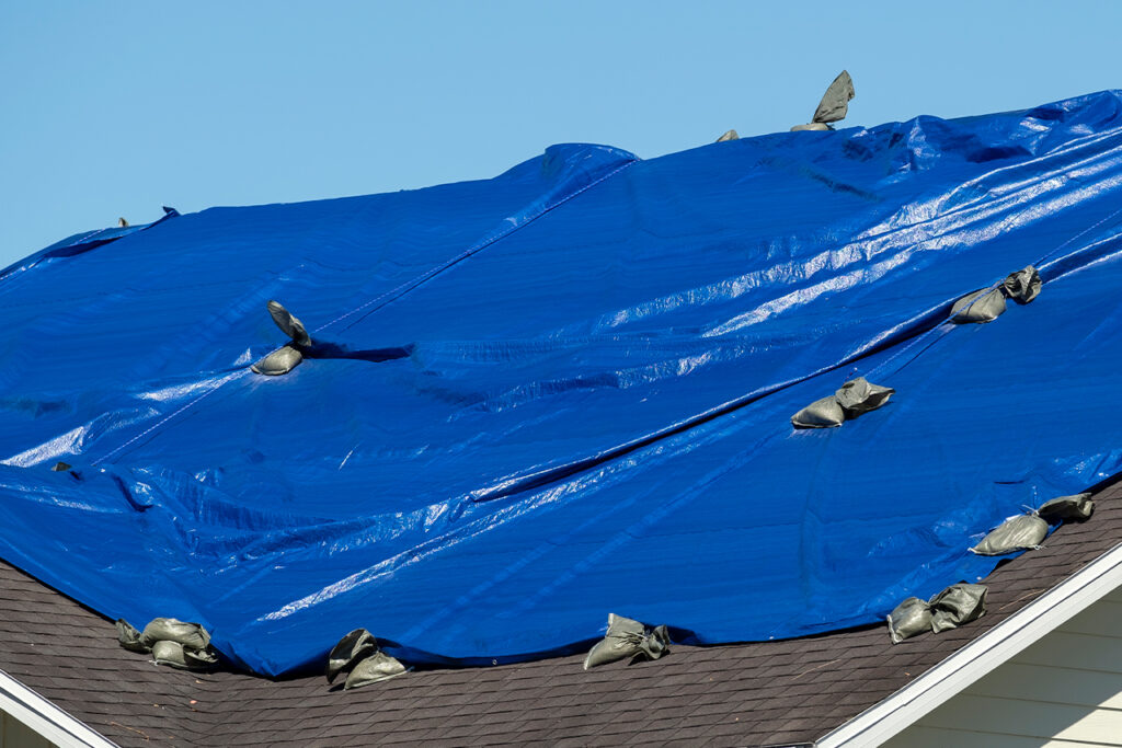 Emergency tarping storm damage temporary repair Lincoln NE