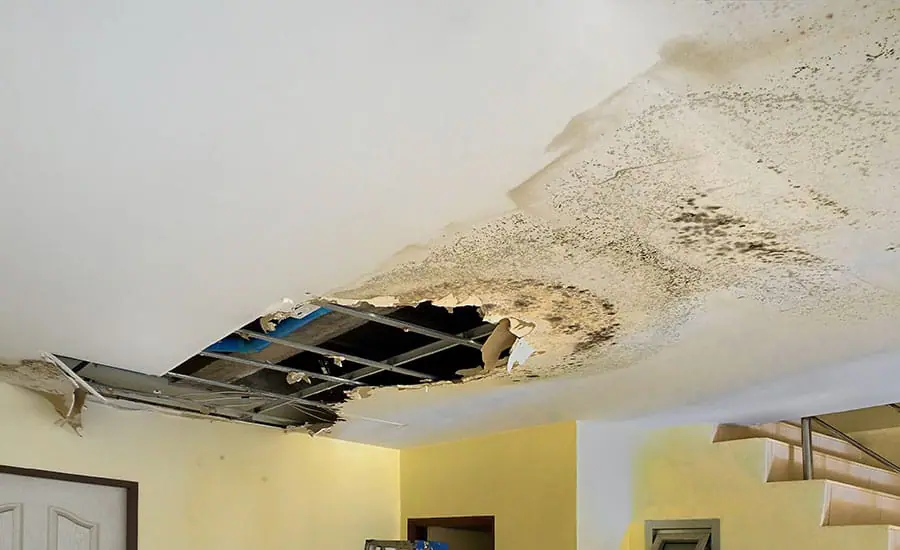 Water damage from storm roof leak Lincoln NE